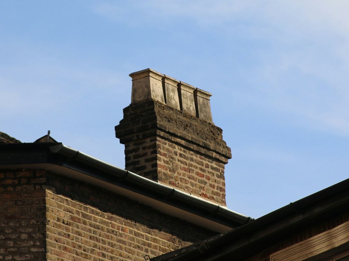 Brick chimney stack on a UK home