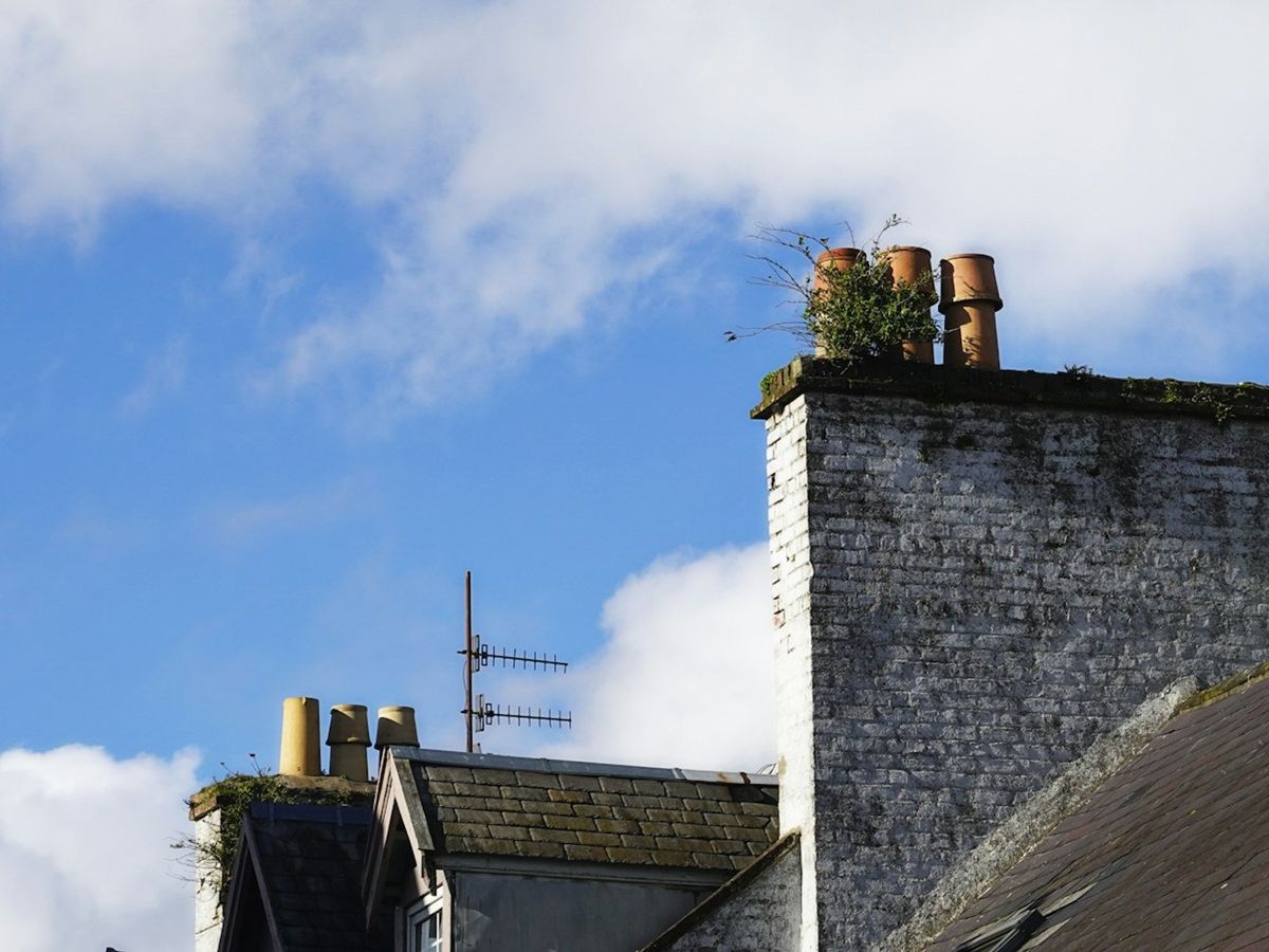 Chimney stack against a blue sky