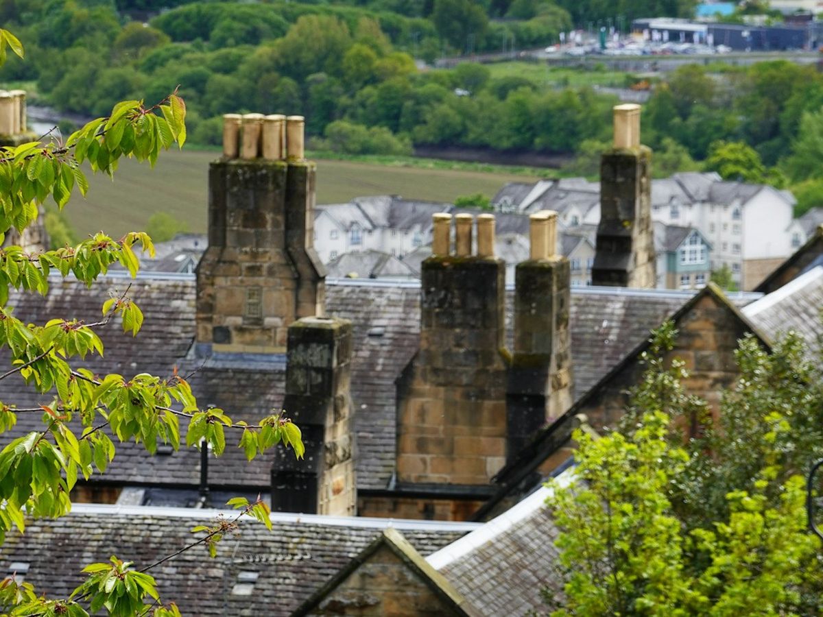 Stone chimneys on a slate roof in northern England