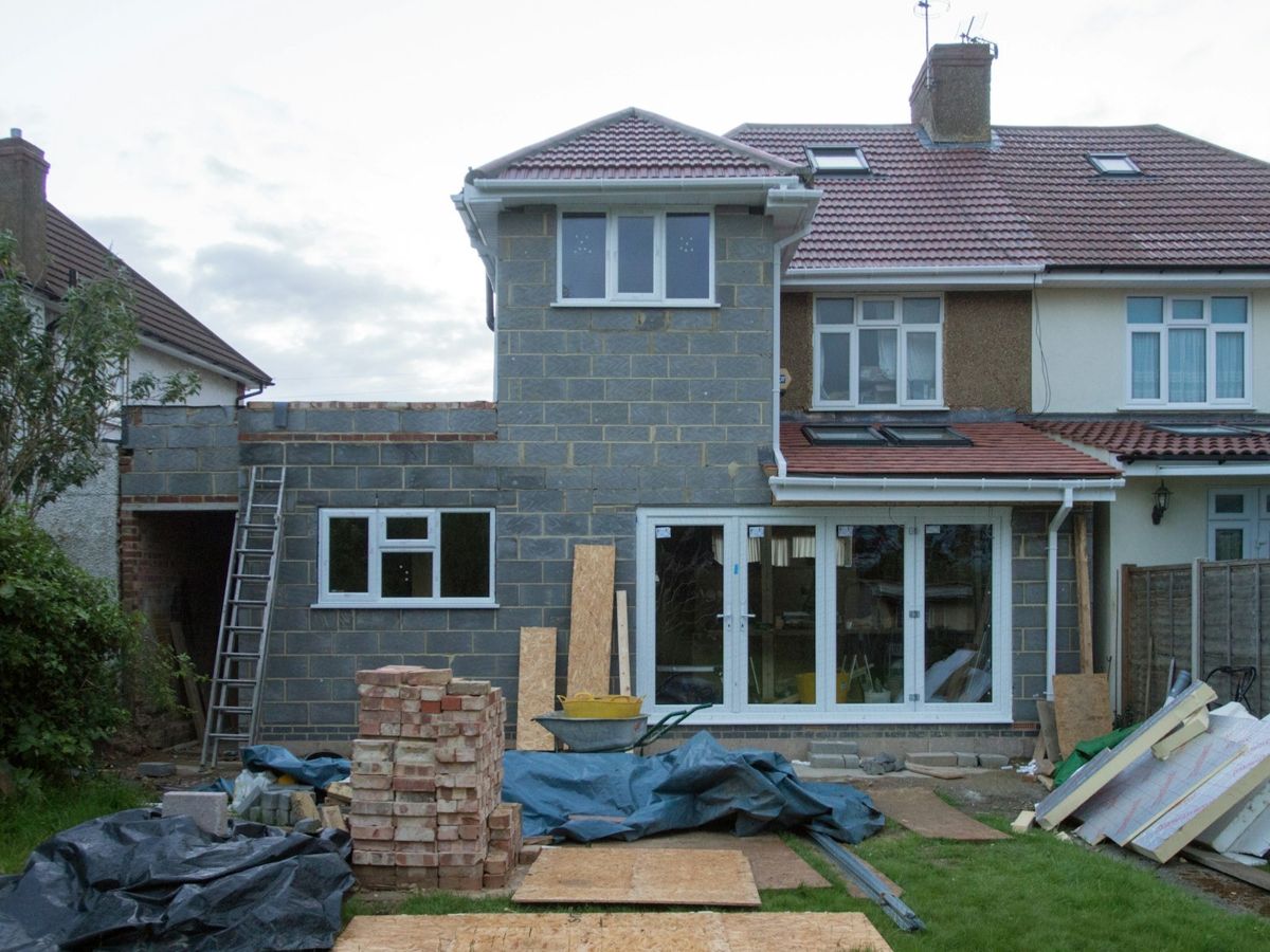 Rear extension with new flat roof on a UK semi