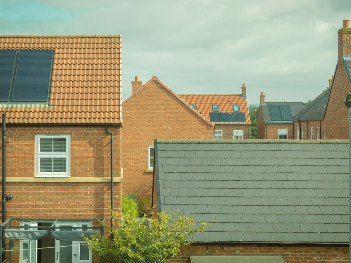 New clay tile roofs on English homes