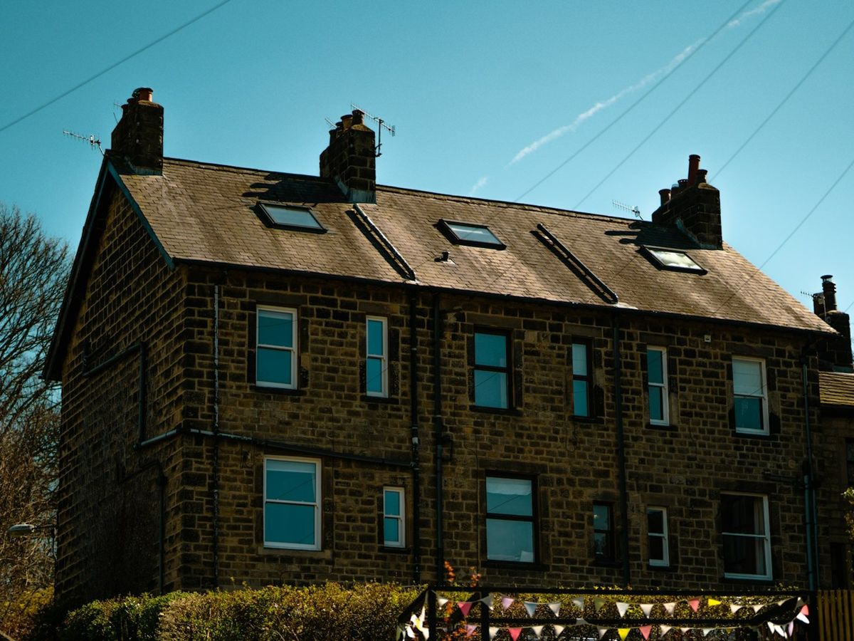 Stone terraced house with a slate roof
