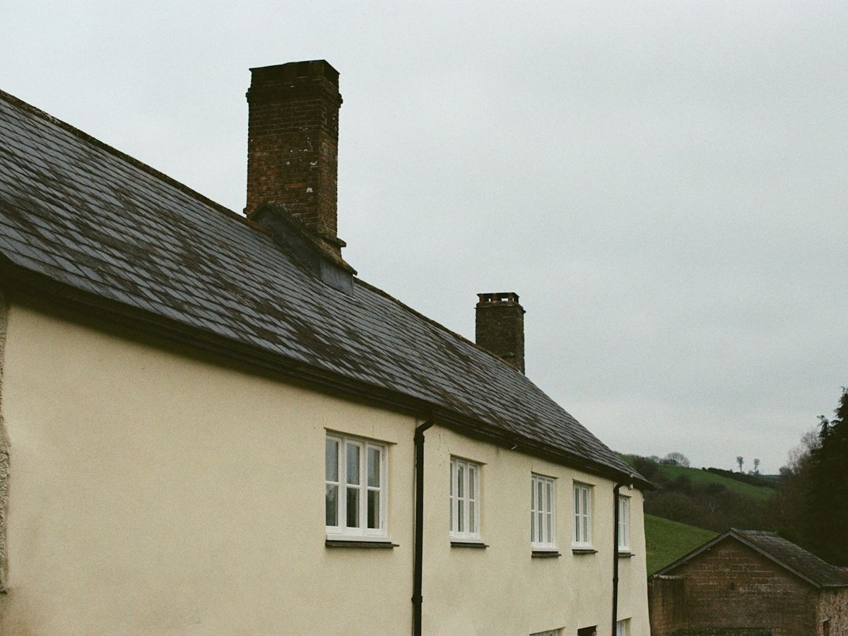 Pitched roof on a rendered UK cottage